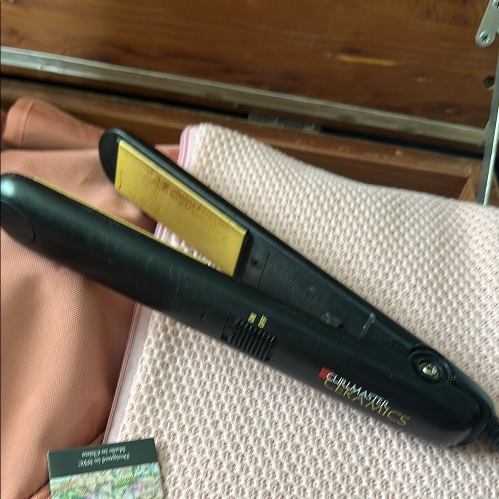 Black Flat Iron with Gold Plates